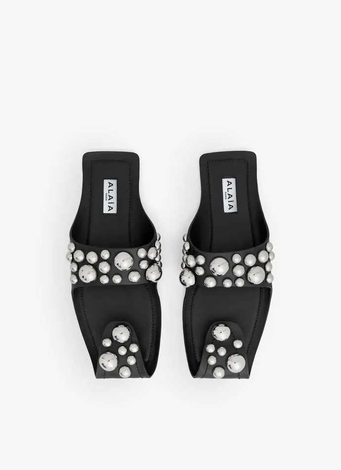 Black FOLDED FLAT MULES WITH SPHERES ON CALFSKIN Women Alaa Flat Shoes