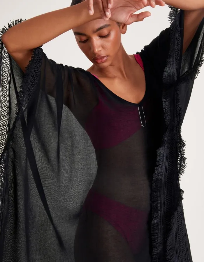 Monsoon Fringe Trim Poncho Women Kaftans and Kimonos Monsoon Fringe Trim Poncho Women Kaftans and Kimonos